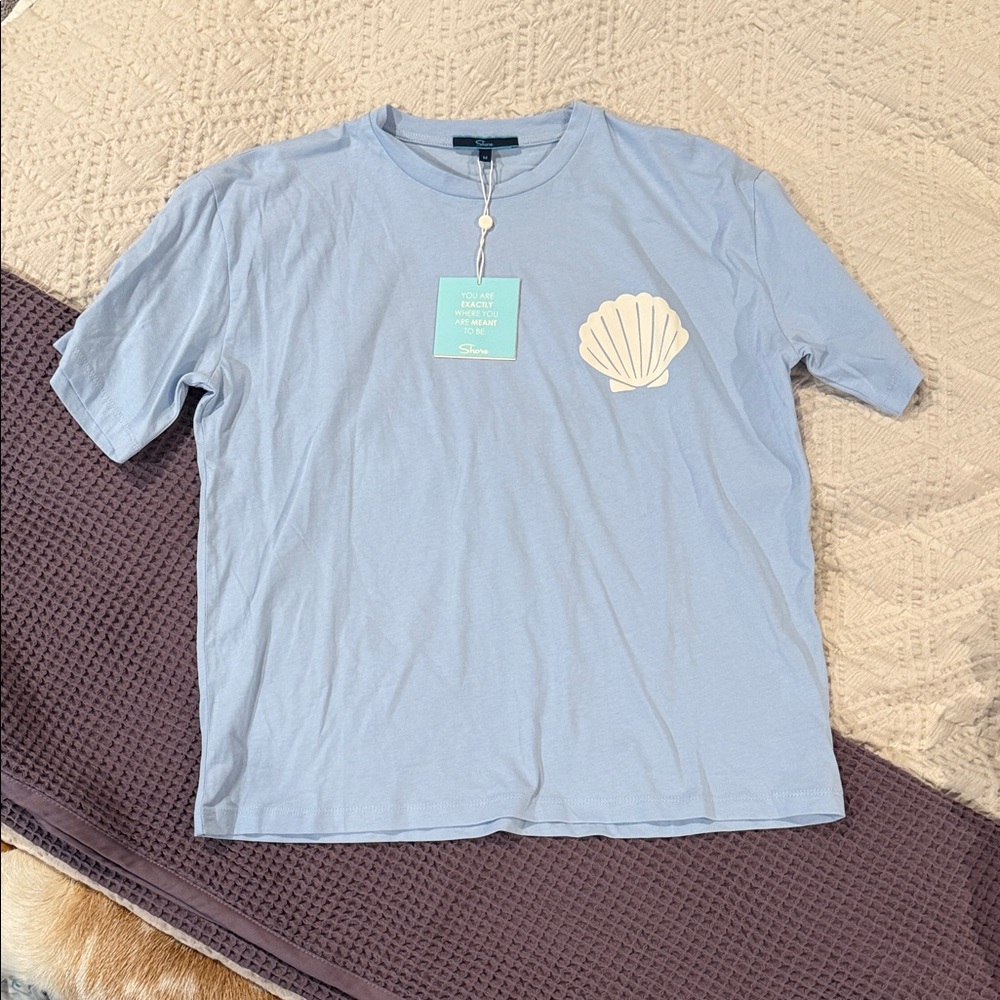 Light Blue T-Shirt with Shell Design